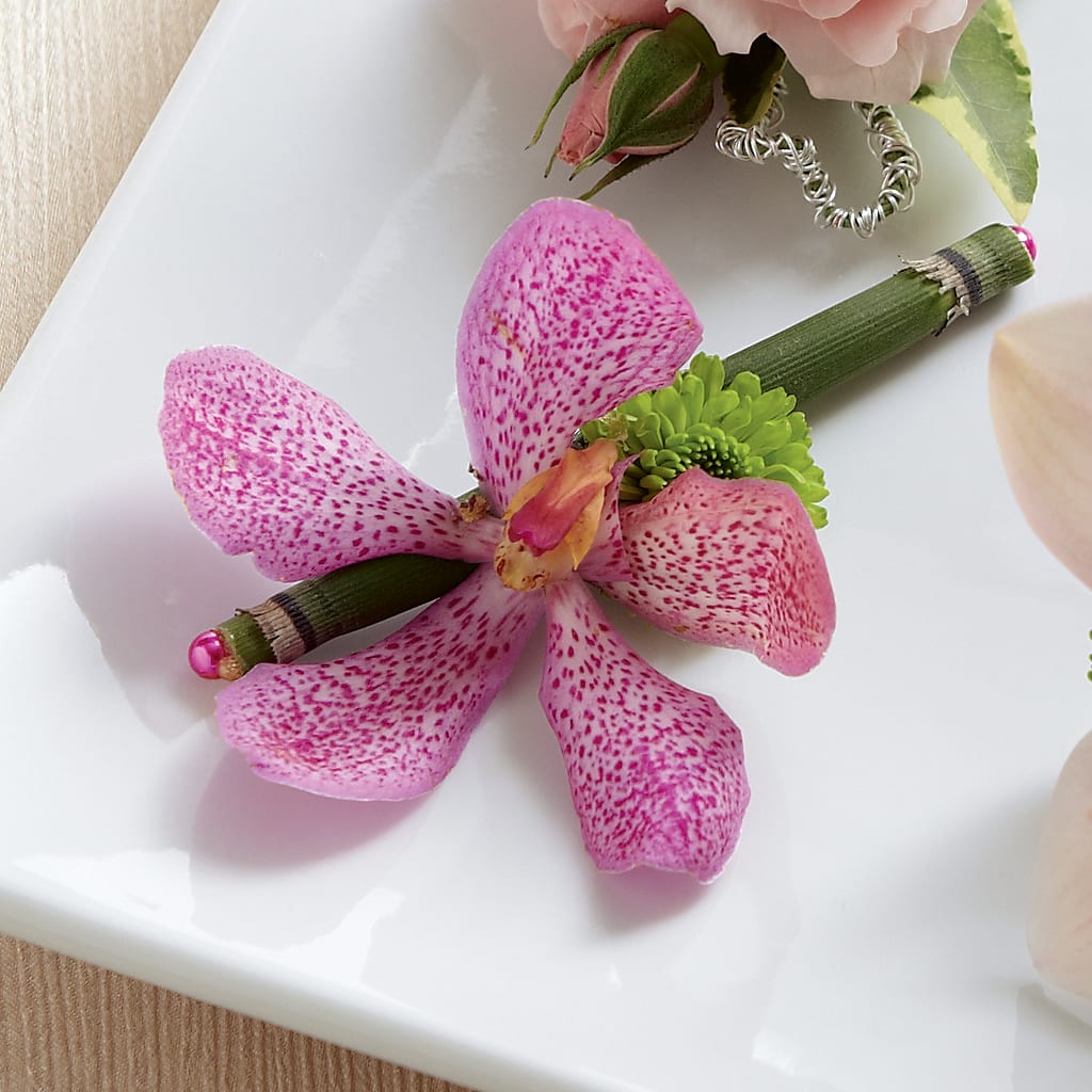 Pink Mokara Boutonniere – Sandelas Flower Shop, Chicago IL